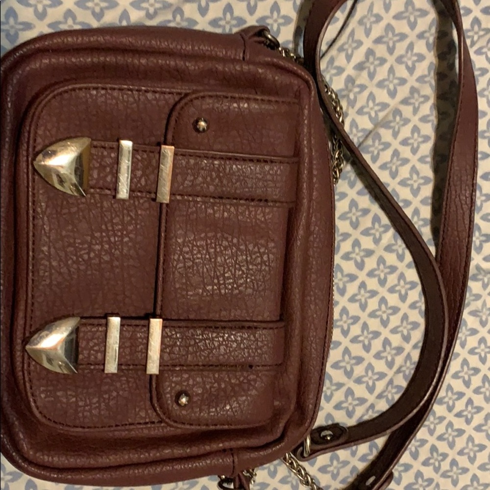 Cato magenta crossbody bag.
